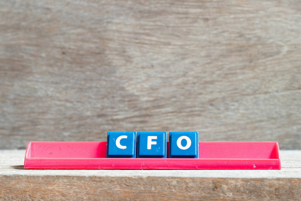 Tile letter on red rack in word CFO